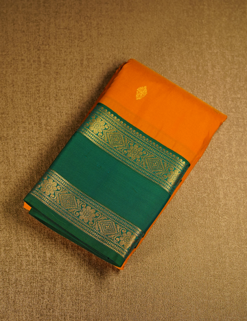 Vibrant Yellow Soft Semi Silk Kanjivaram Saree with Peacock Green Zari Border