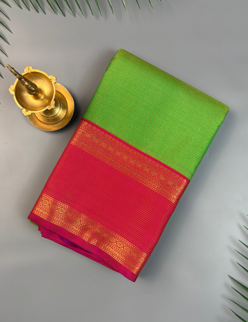Parrot Green Soft Semi Silk Kanjivaram with Rani Pink Retta Pettu Zari Border