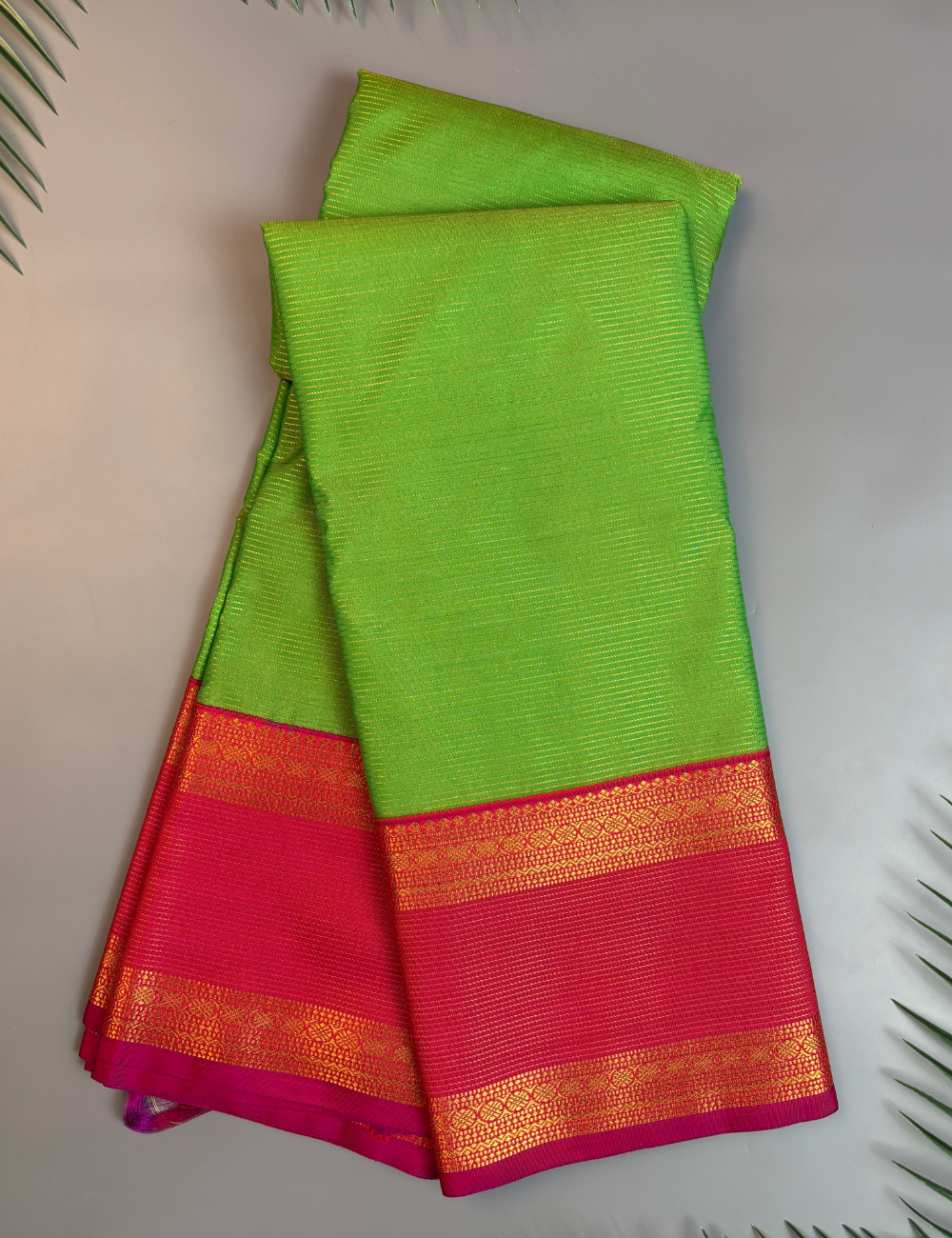 Parrot Green Soft Semi Silk Kanjivaram with Rani Pink Retta Pettu Zari Border