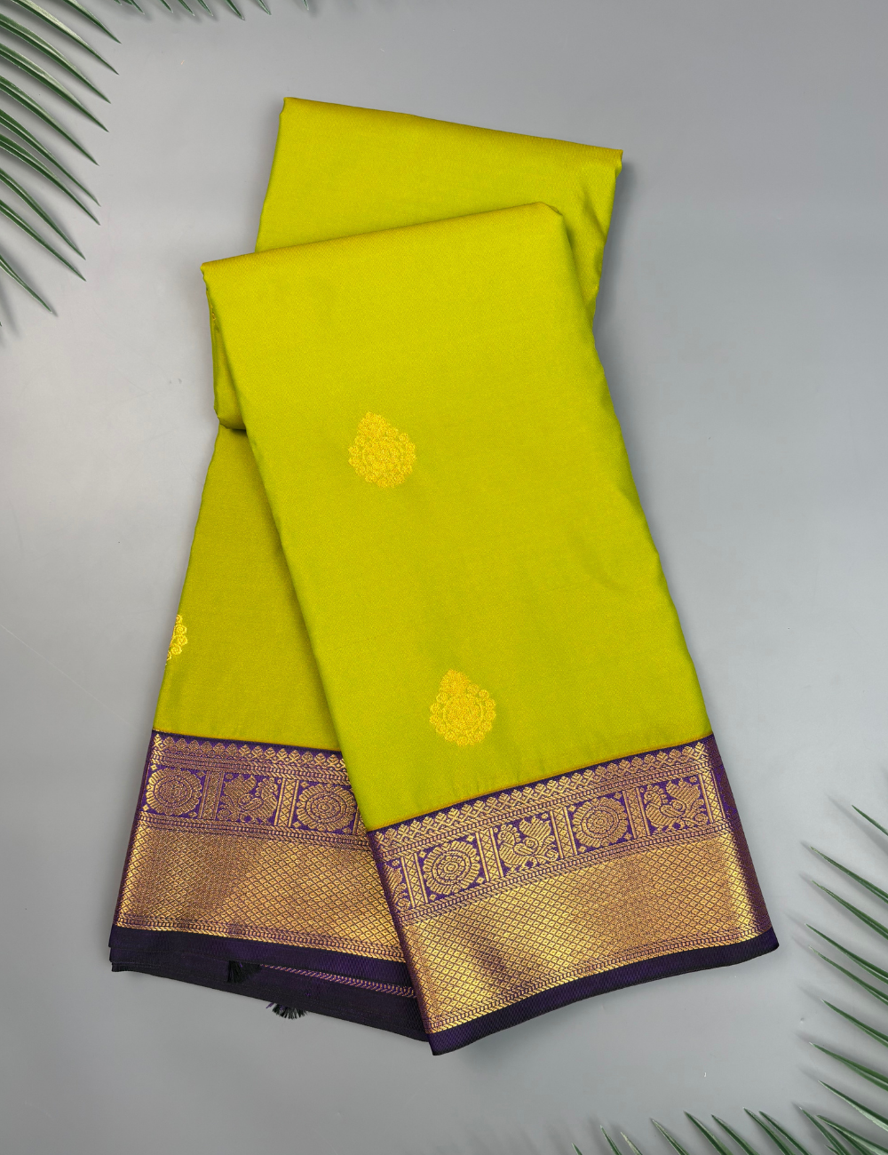 Light green soft semi silk kanjivaram saree with violet zari korvai border