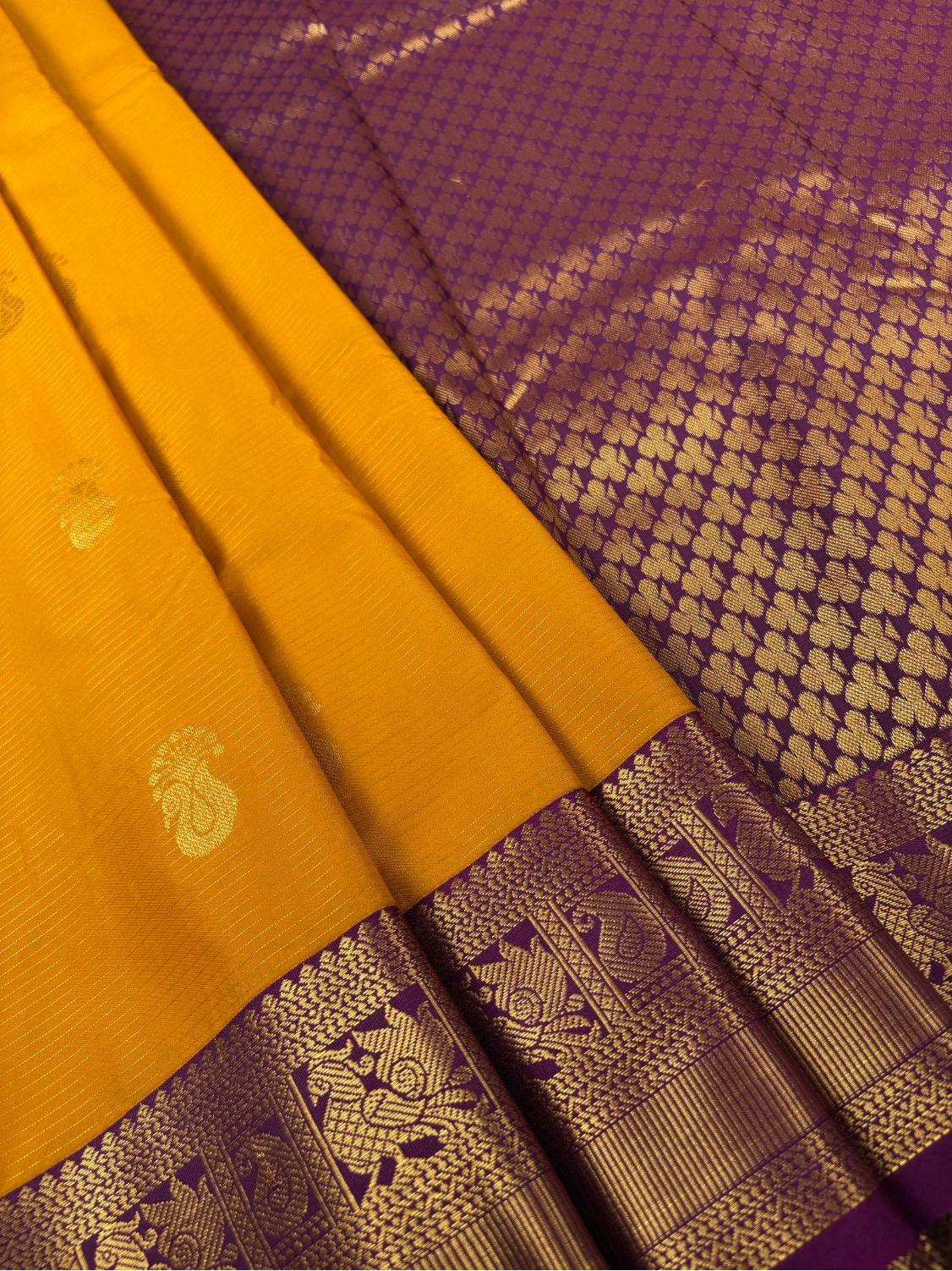 Marigold yellow Soft Semi Silk Kanjivaram with Korvai Purple Zari Border Saree