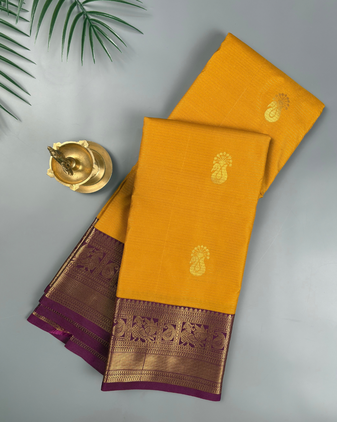 Marigold yellow Soft Semi Silk Kanjivaram with Korvai Purple Zari Border Saree