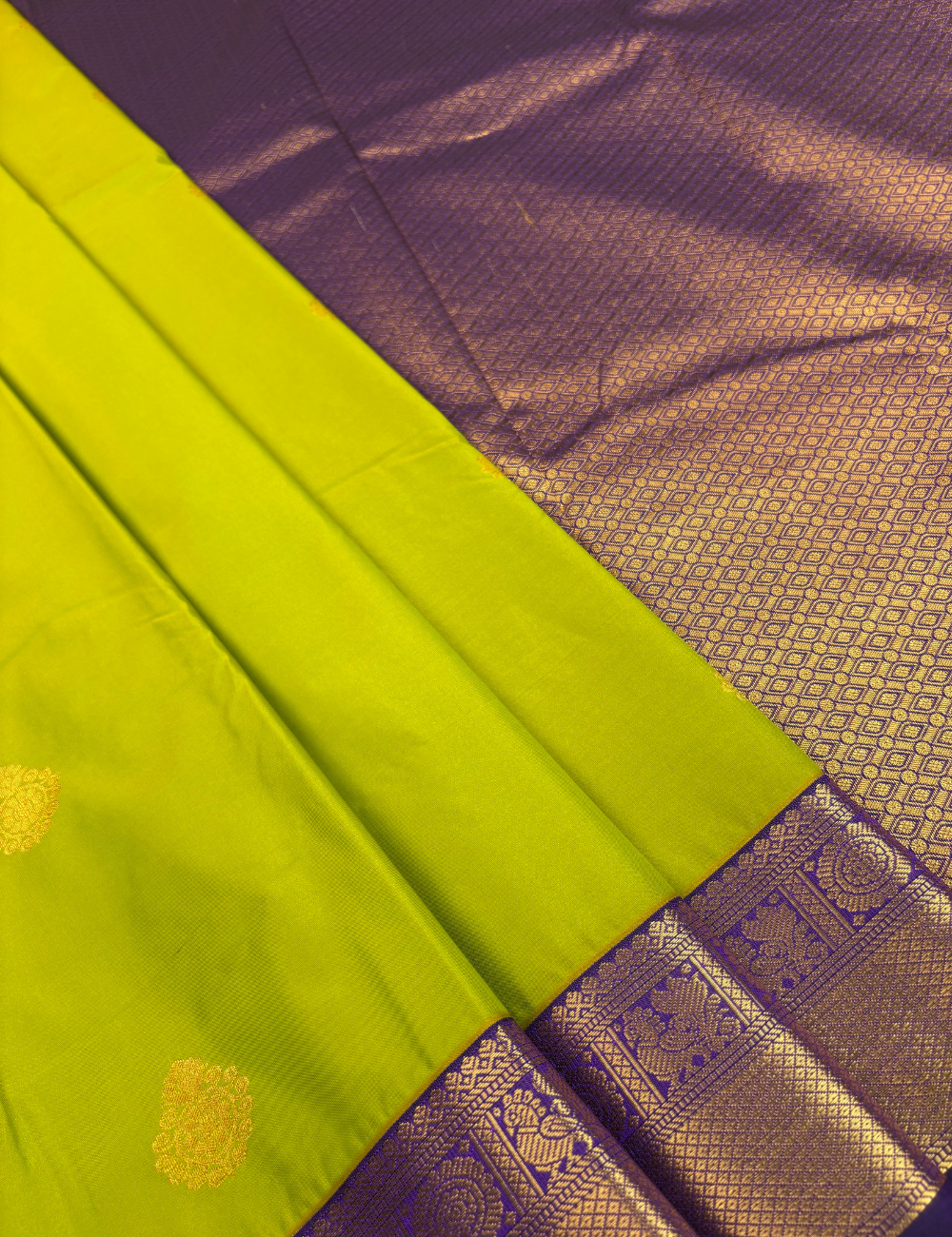 Light green soft semi silk kanjivaram saree with violet zari korvai border