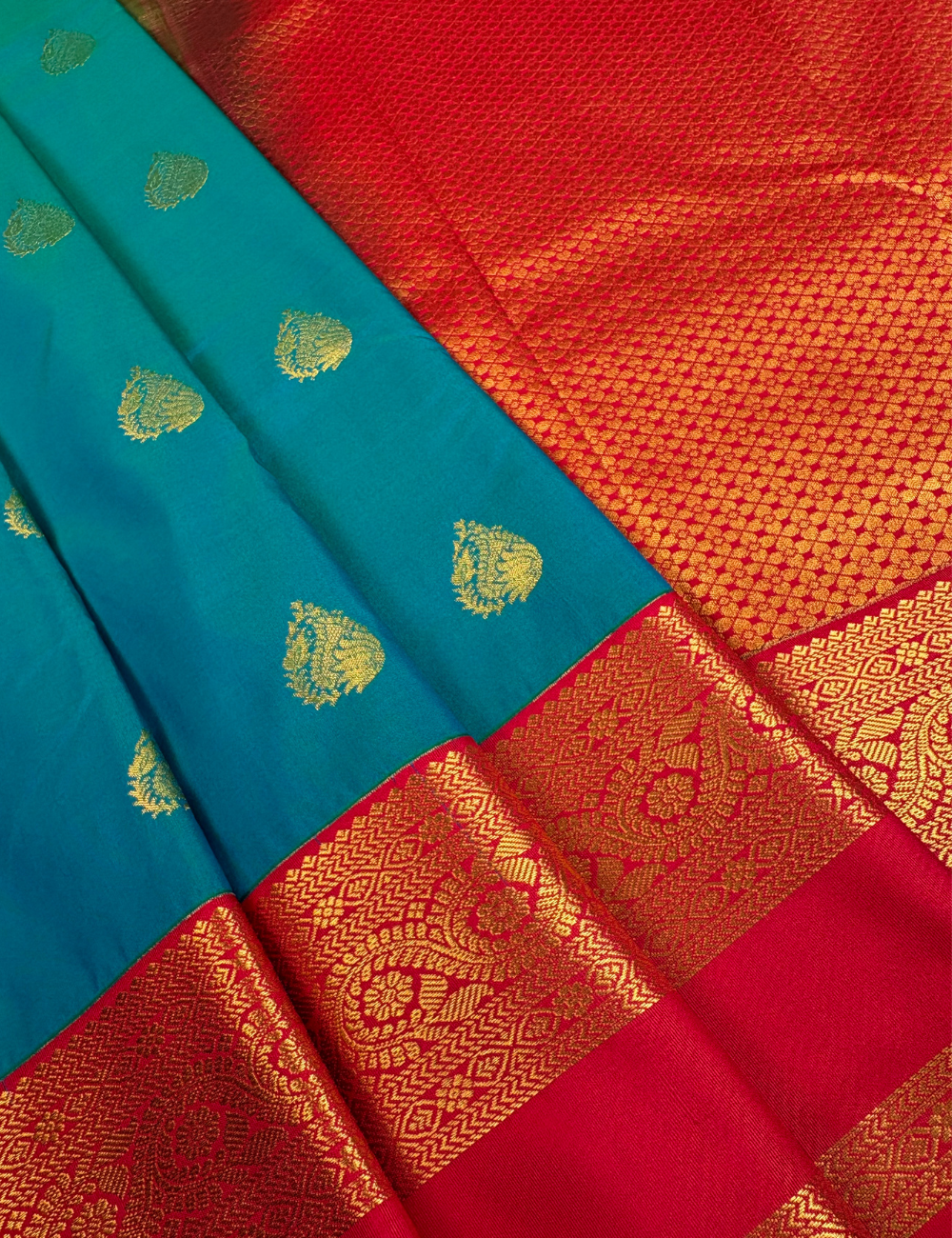Peacock Blue Soft Semi Silk Kanjivaram Saree with Vibrant Coral Red Border