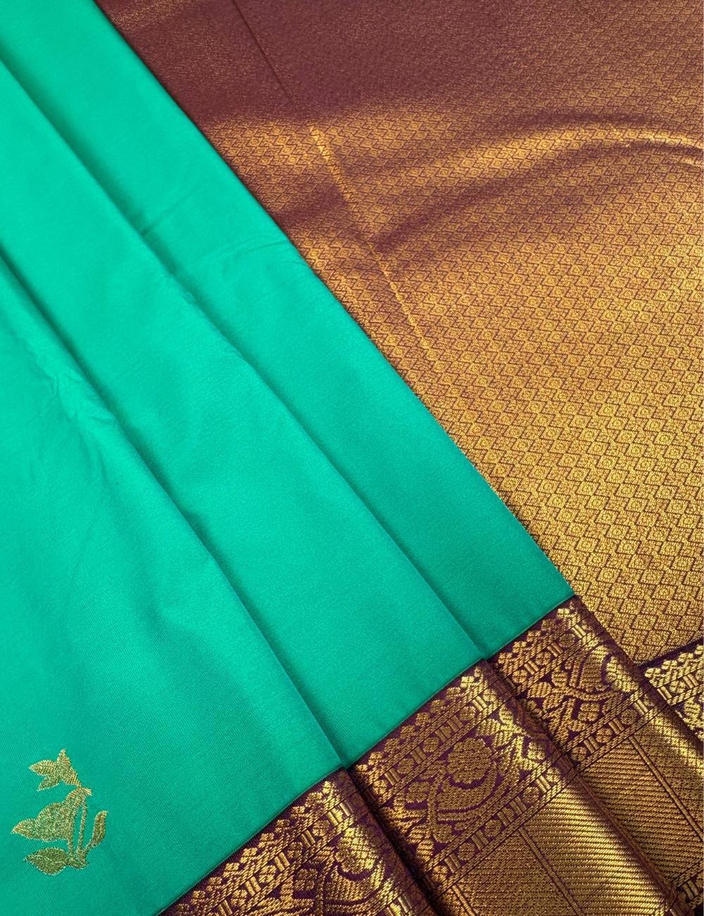 Rama Green soft semi silk kanjivaram saree with korvai purple border
