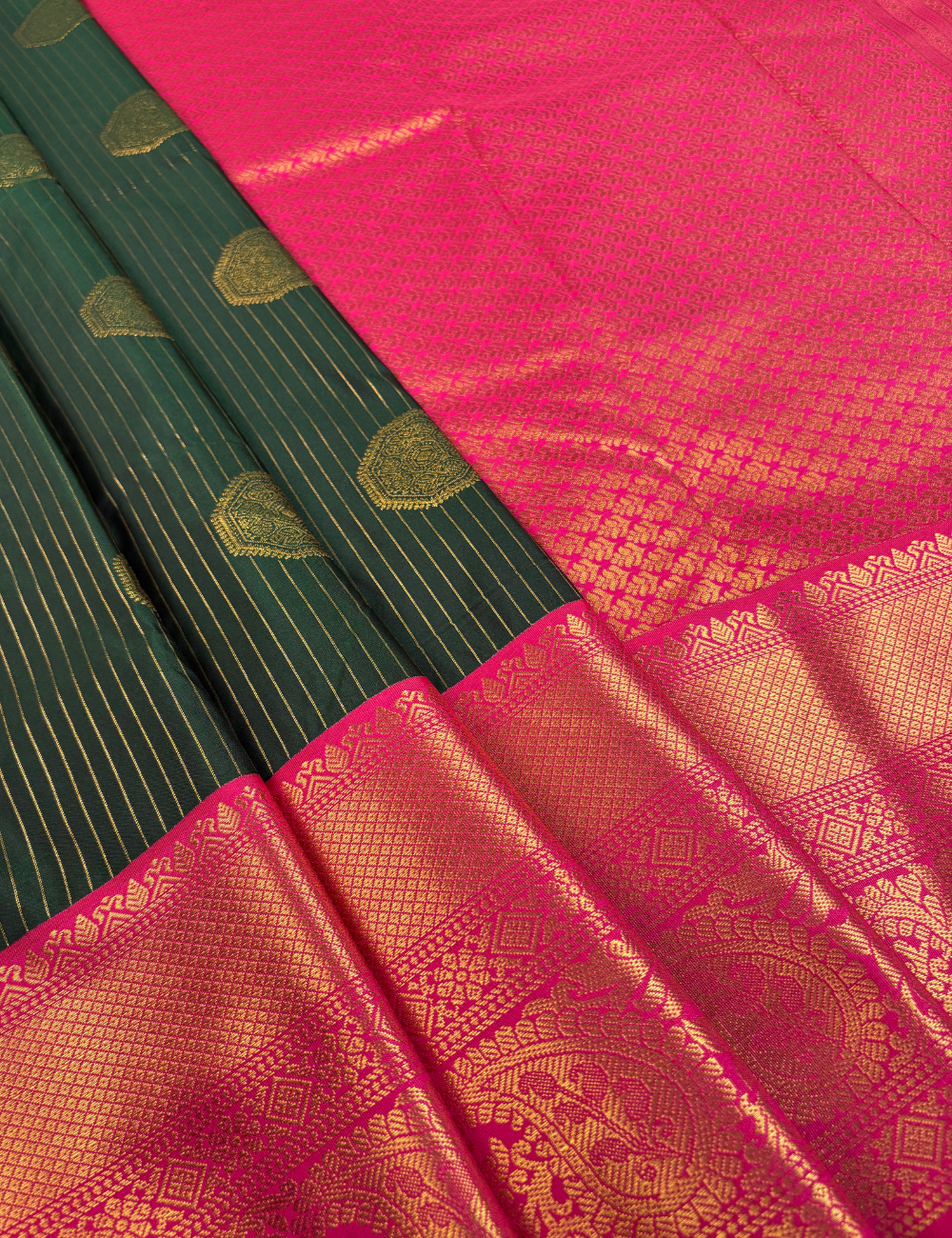 Deep Bottle green soft semi silk kanjivaram saree with pink korvai border