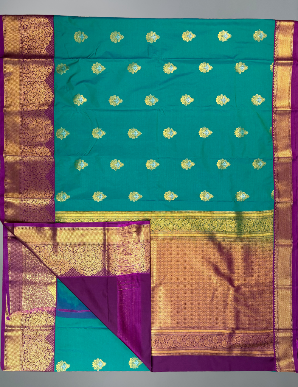 Peacock green soft semi silk kanjivaram saree with magenta korvai border