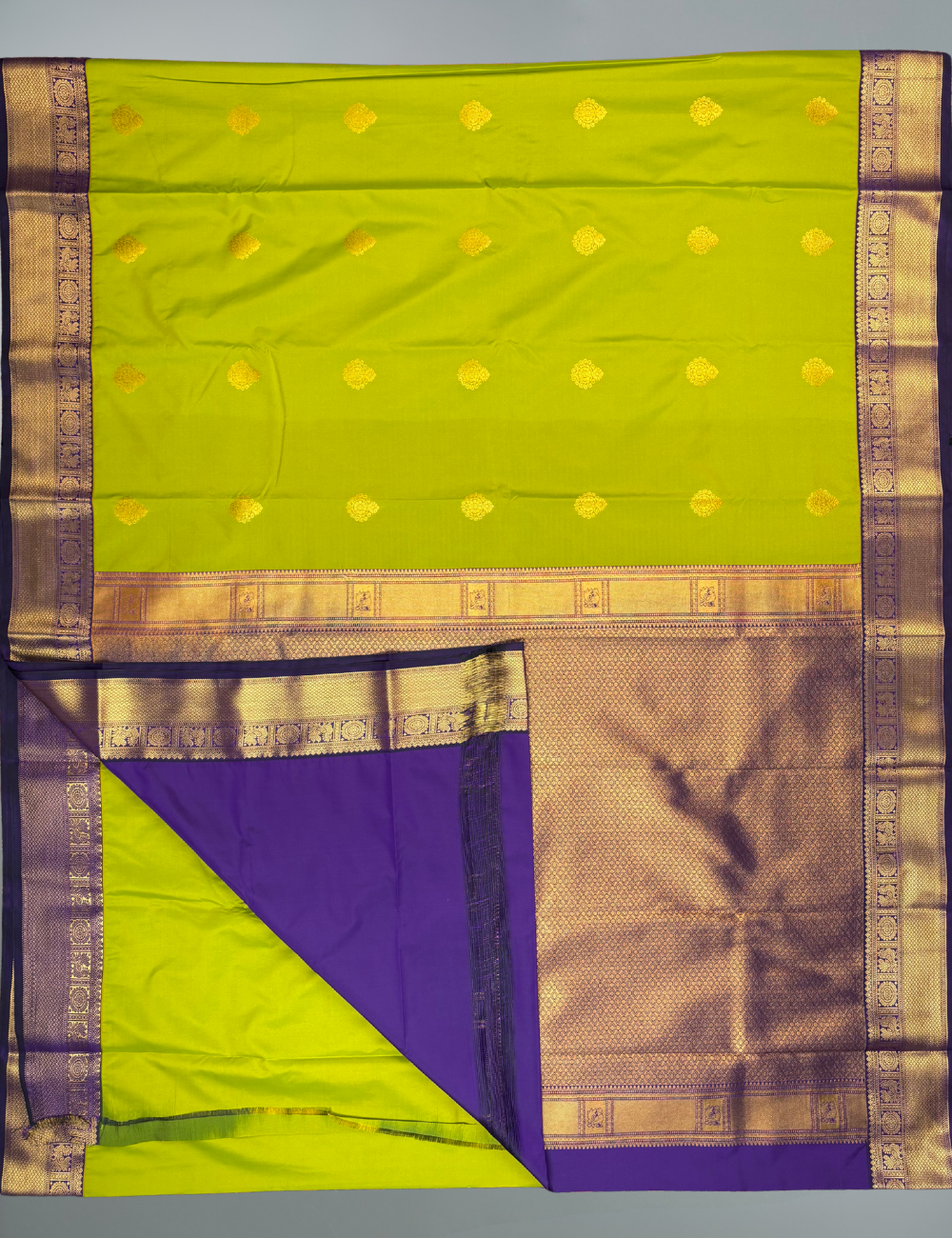 Light green soft semi silk kanjivaram saree with violet zari korvai border