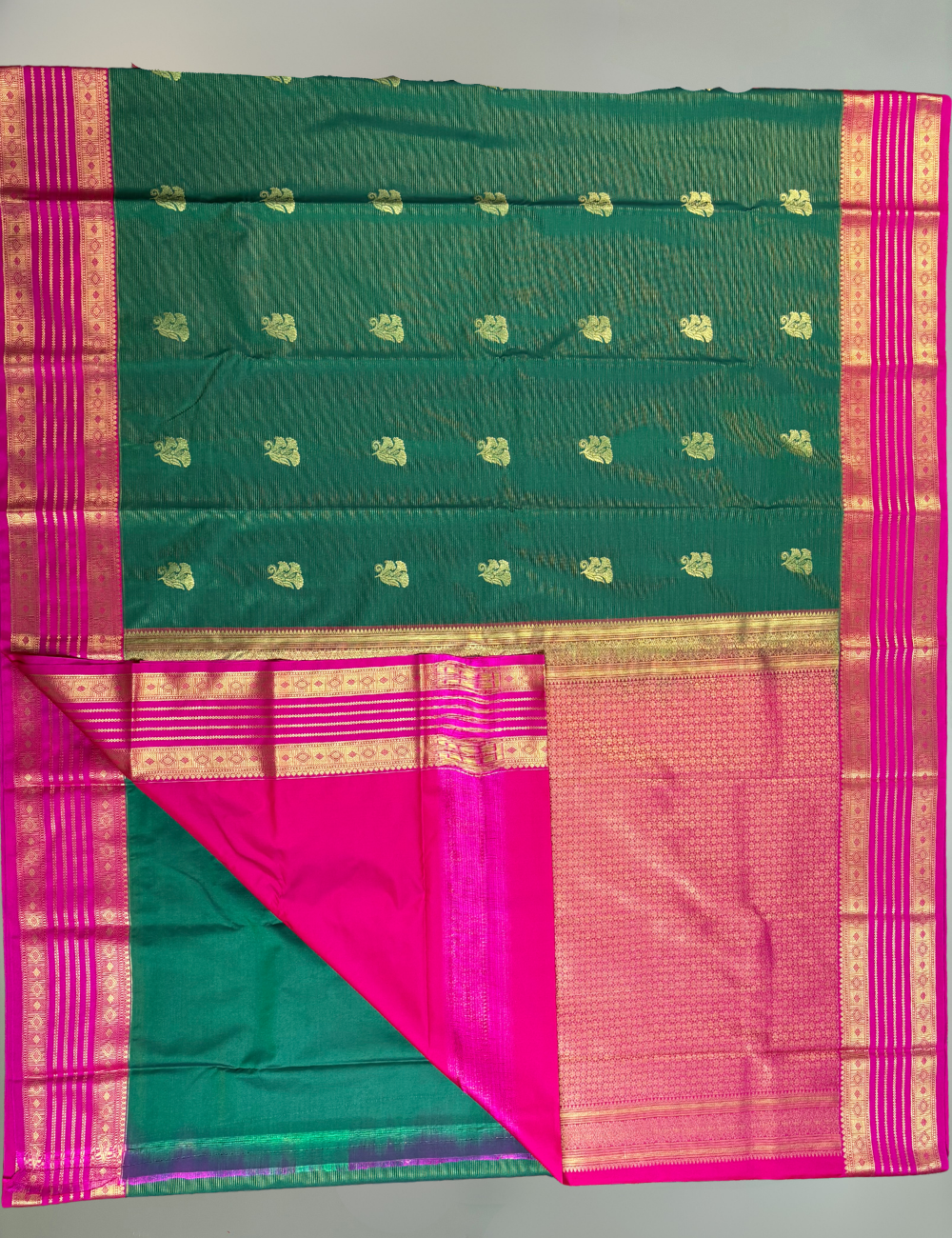 Emerald Green Soft Semi Silk Kanjivaram Saree with traditional Korvai Rani Pink Border