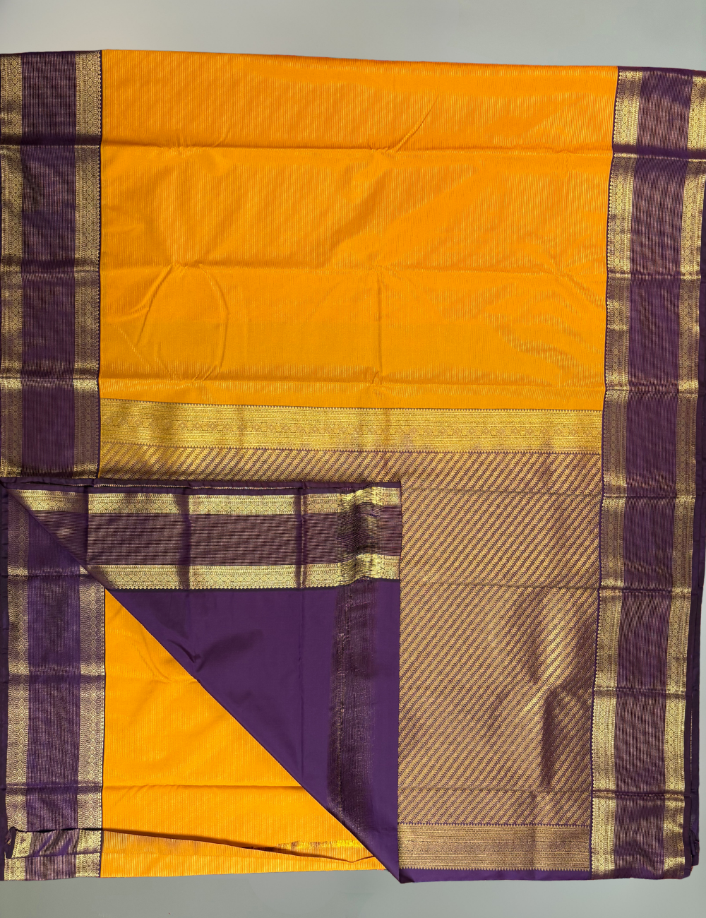 Mustard Yellow Soft Semi Silk Kanjivaram Saree with Purple Rette Pettu Zari Border