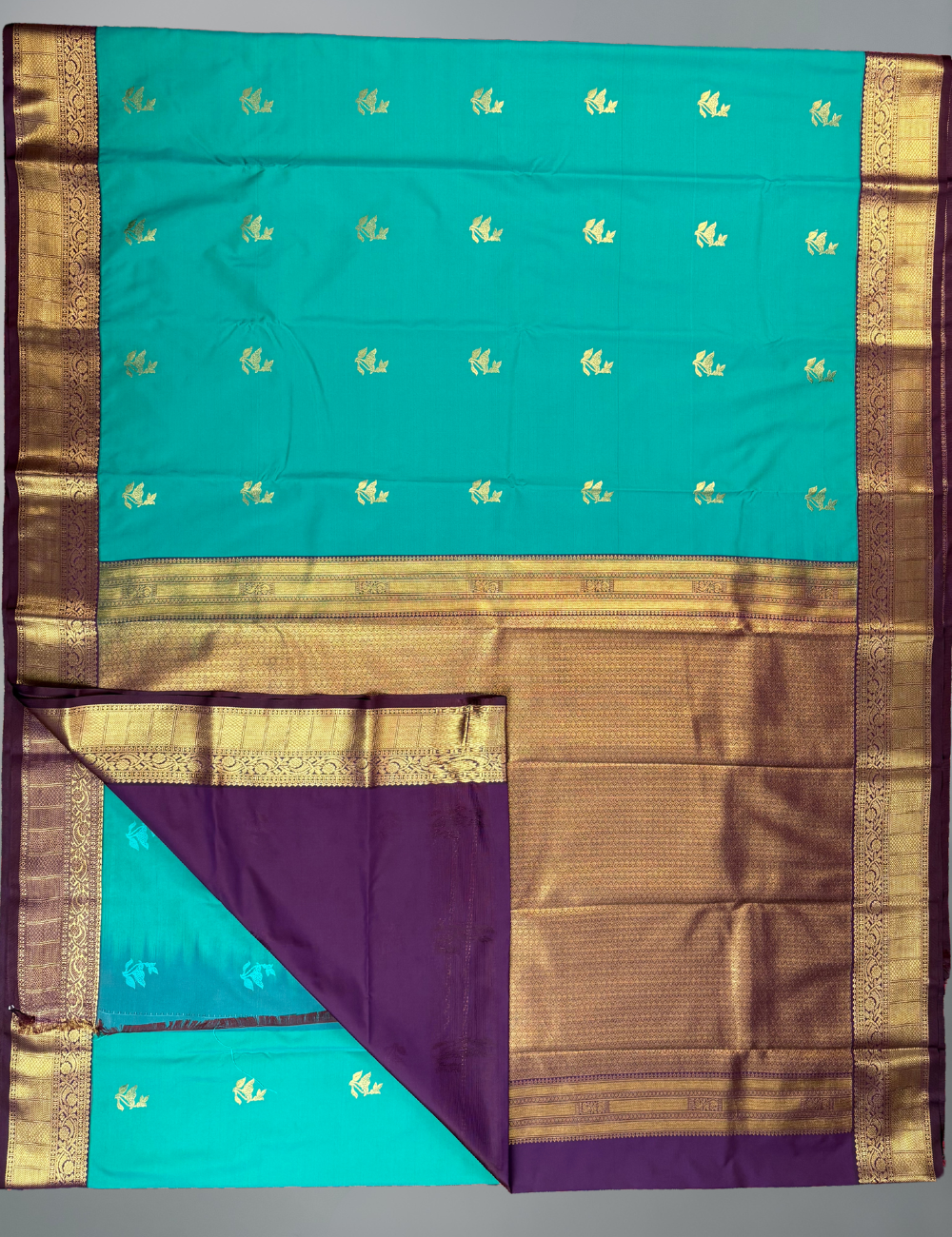 Rama Green soft semi silk kanjivaram saree with korvai purple border