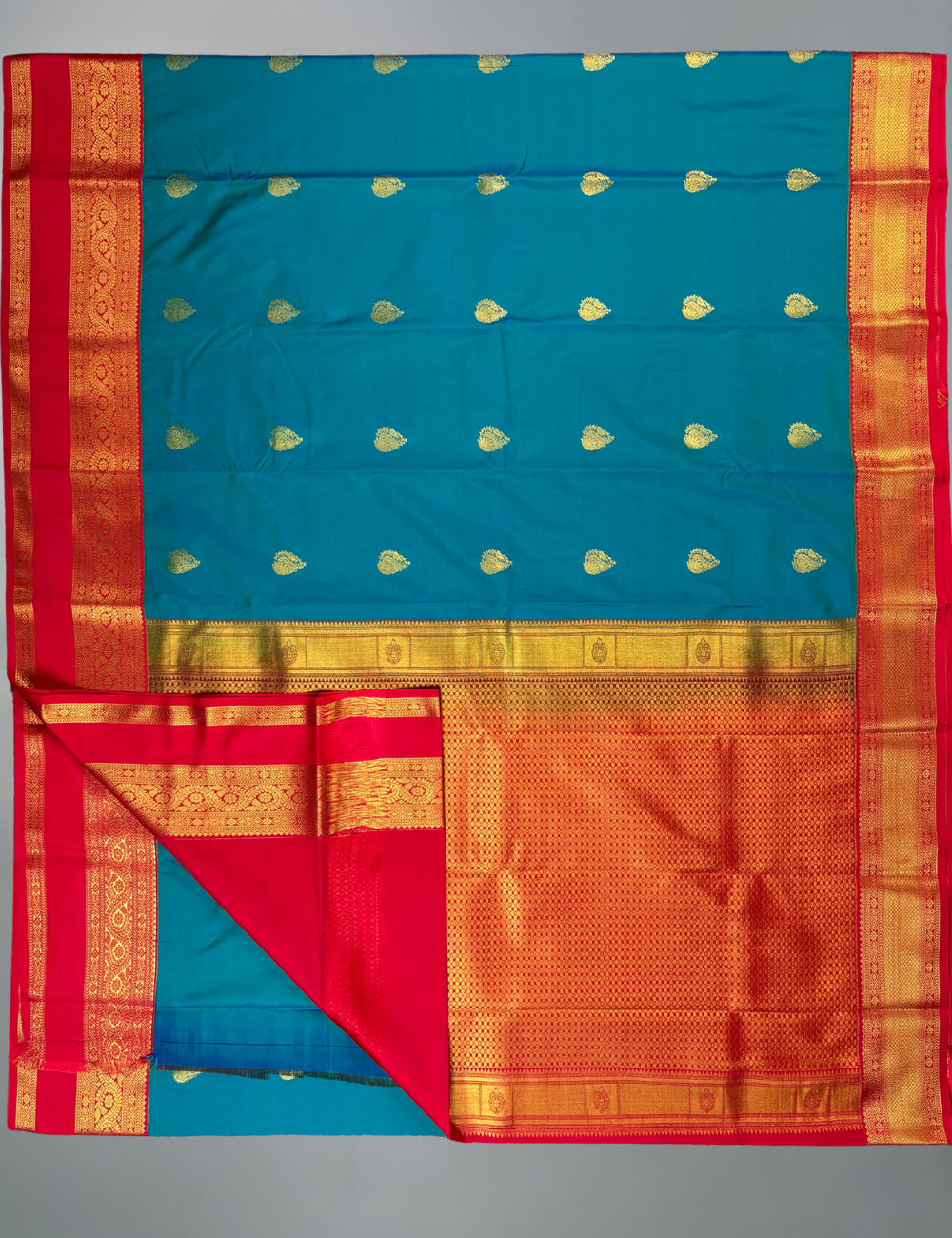 Peacock Blue Soft Semi Silk Kanjivaram Saree with Vibrant Coral Red Border
