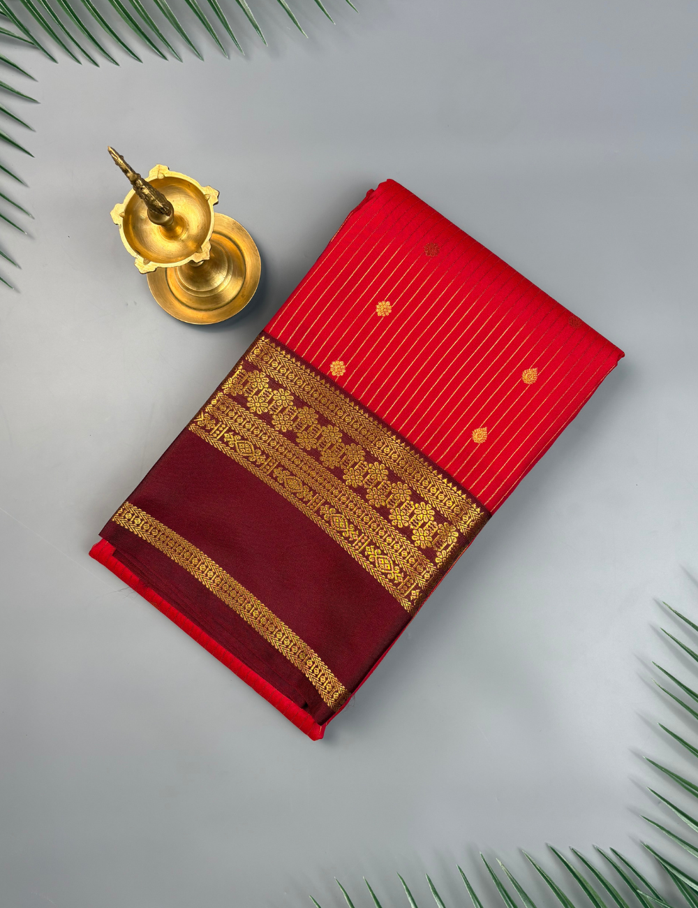 Bright Red Semi Silk Saree with Contrast Maroon Zari Border & Gold Motifs
