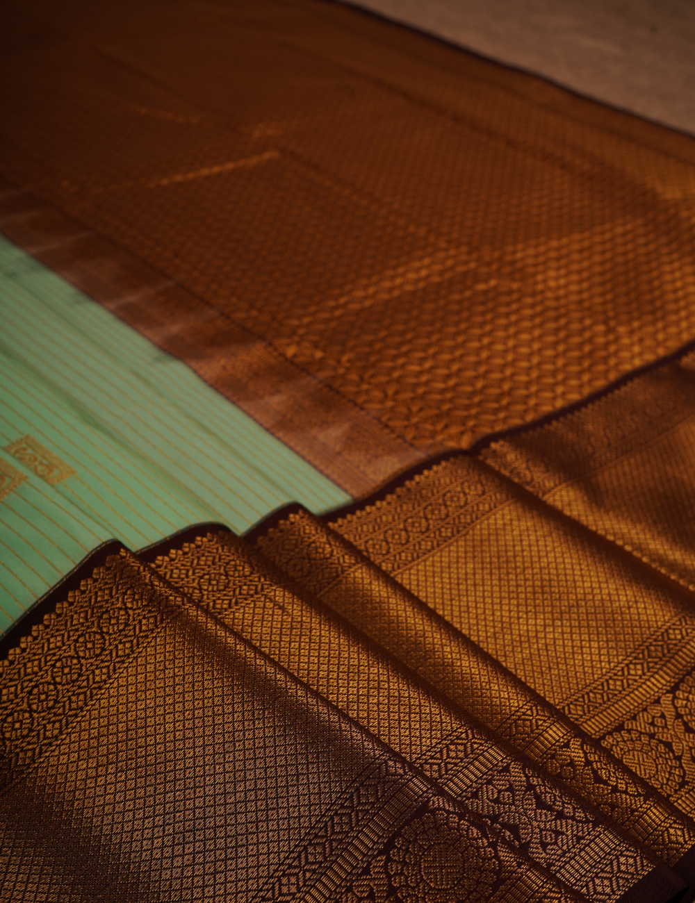 Pastel Mint Green Soft Kanjivaram Semi Silk Saree with Brown Zari Border