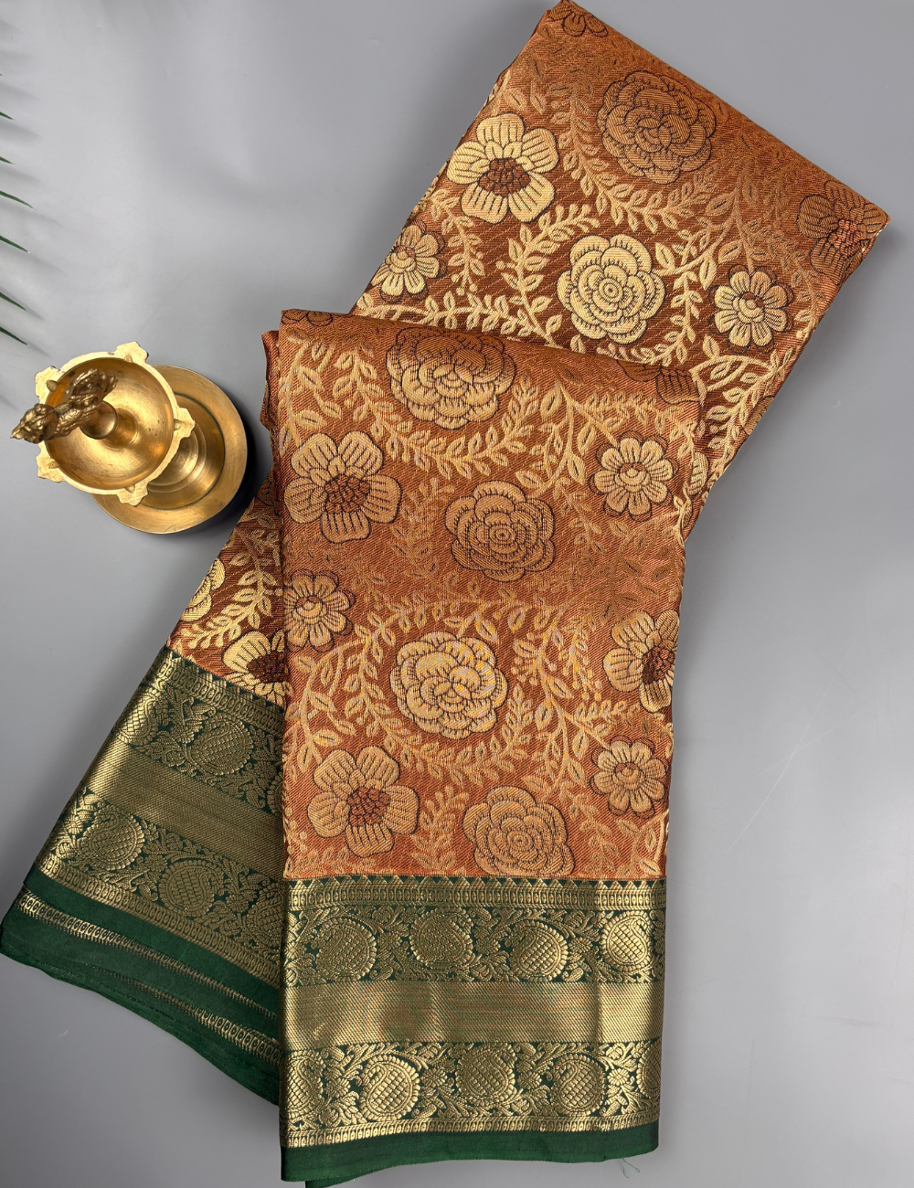 Elegant Rust Orange FLoral Brocade Semi Silk Saree with Antique Gold Border