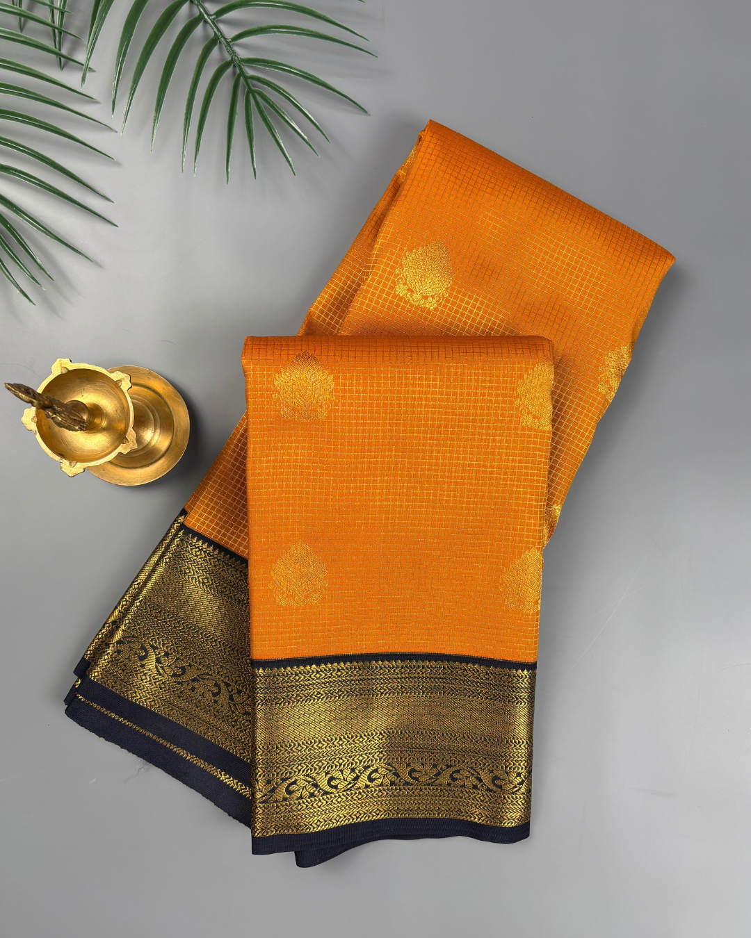 Marigold yellow Soft Kanjivaram Semi Silk with Korvai Navy Border Saree
