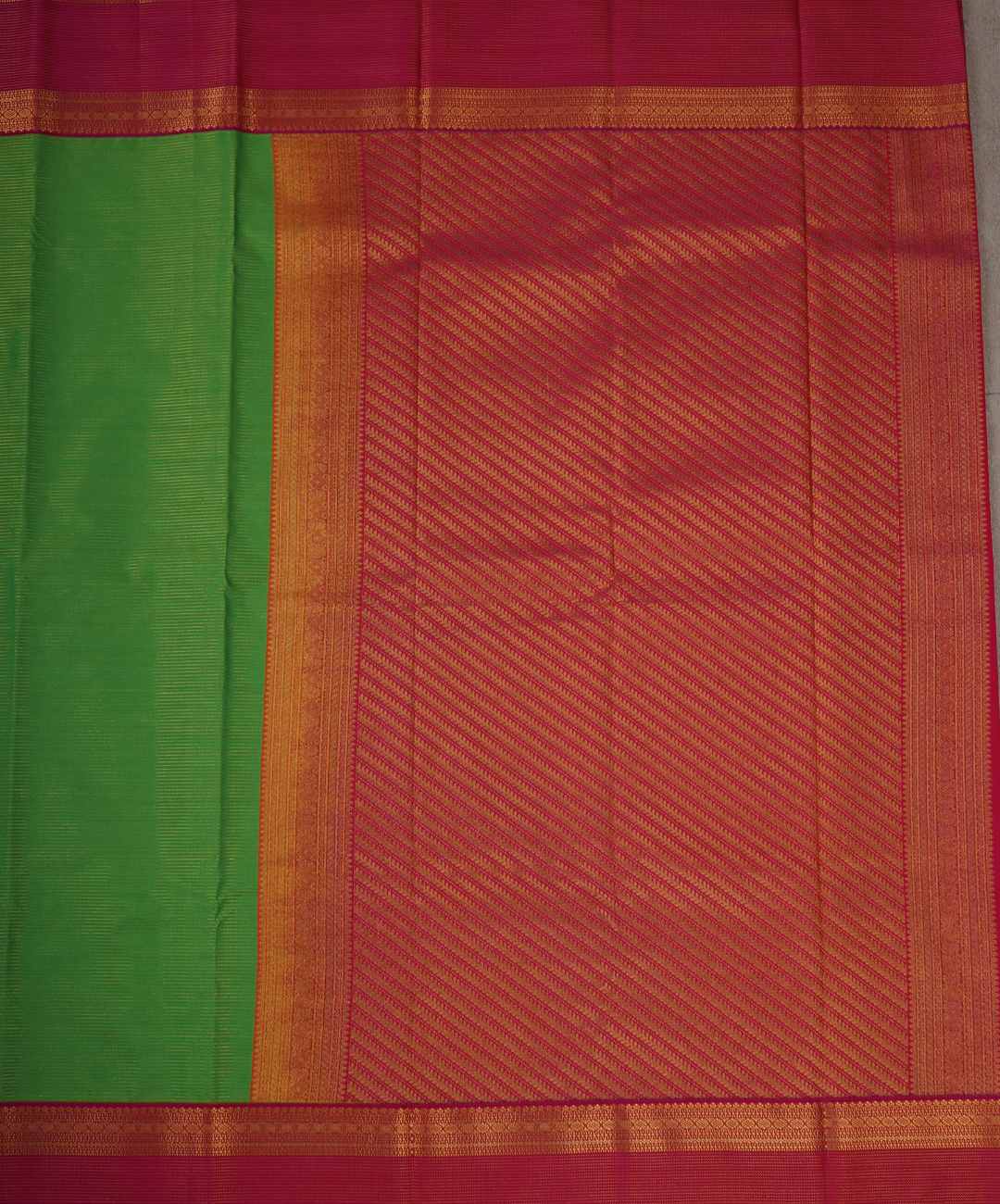 Parrot Green Soft Semi Silk Kanjivaram with Rani Pink Retta Pettu Zari Border