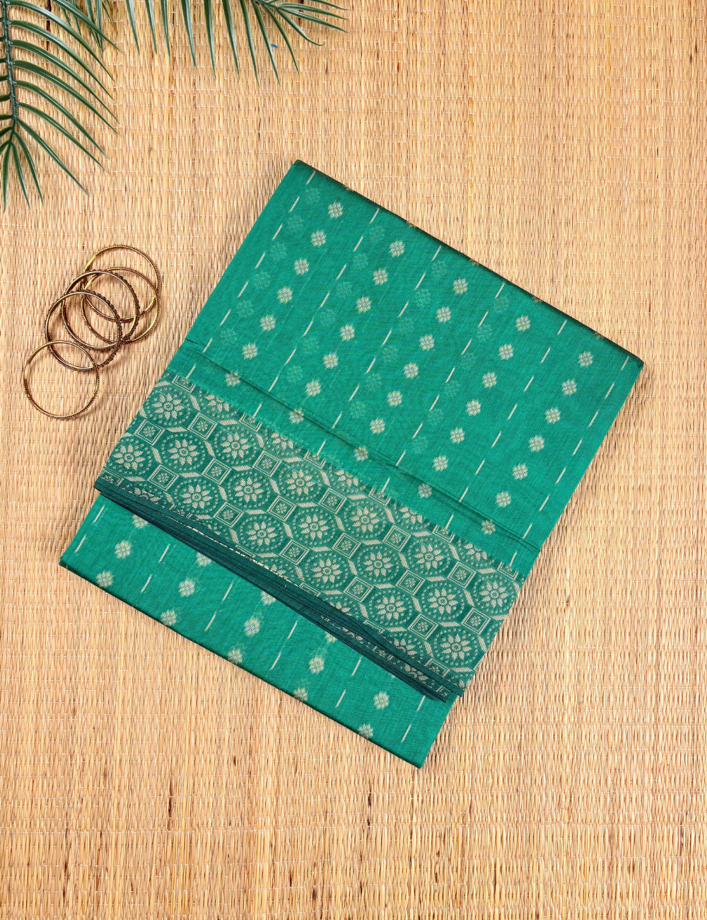 Emerald Bloom Aranya Cotton Saree with Elegant Geometric Thread Border