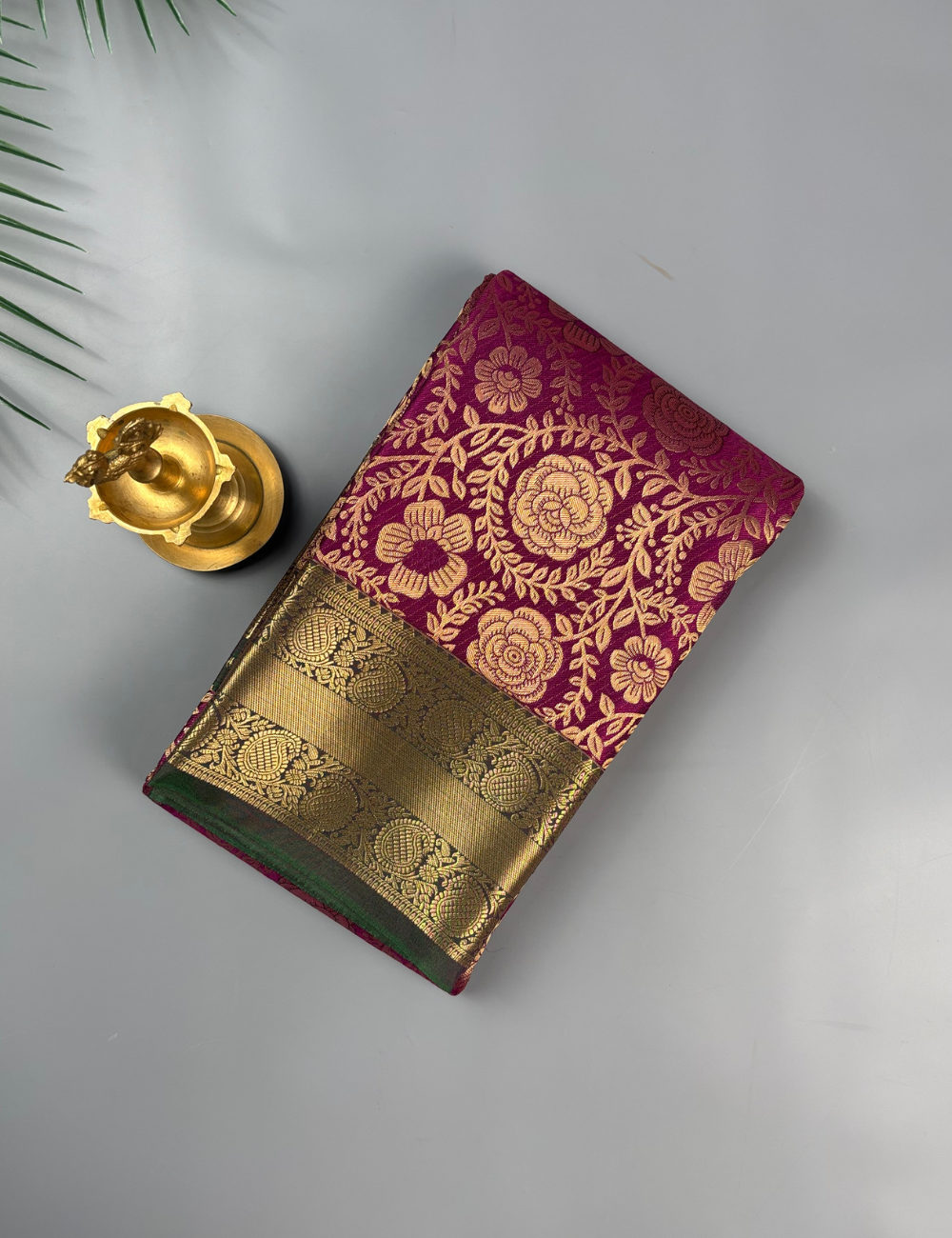 Majestic Wine Purple Floral Brocade Soft Semi Silk Saree with Antique Gold Zari Border