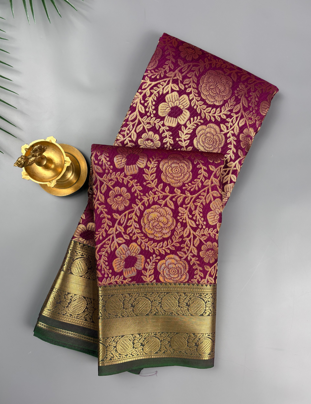 Majestic Wine Purple Floral Brocade Soft Semi Silk Saree with Antique Gold Zari Border