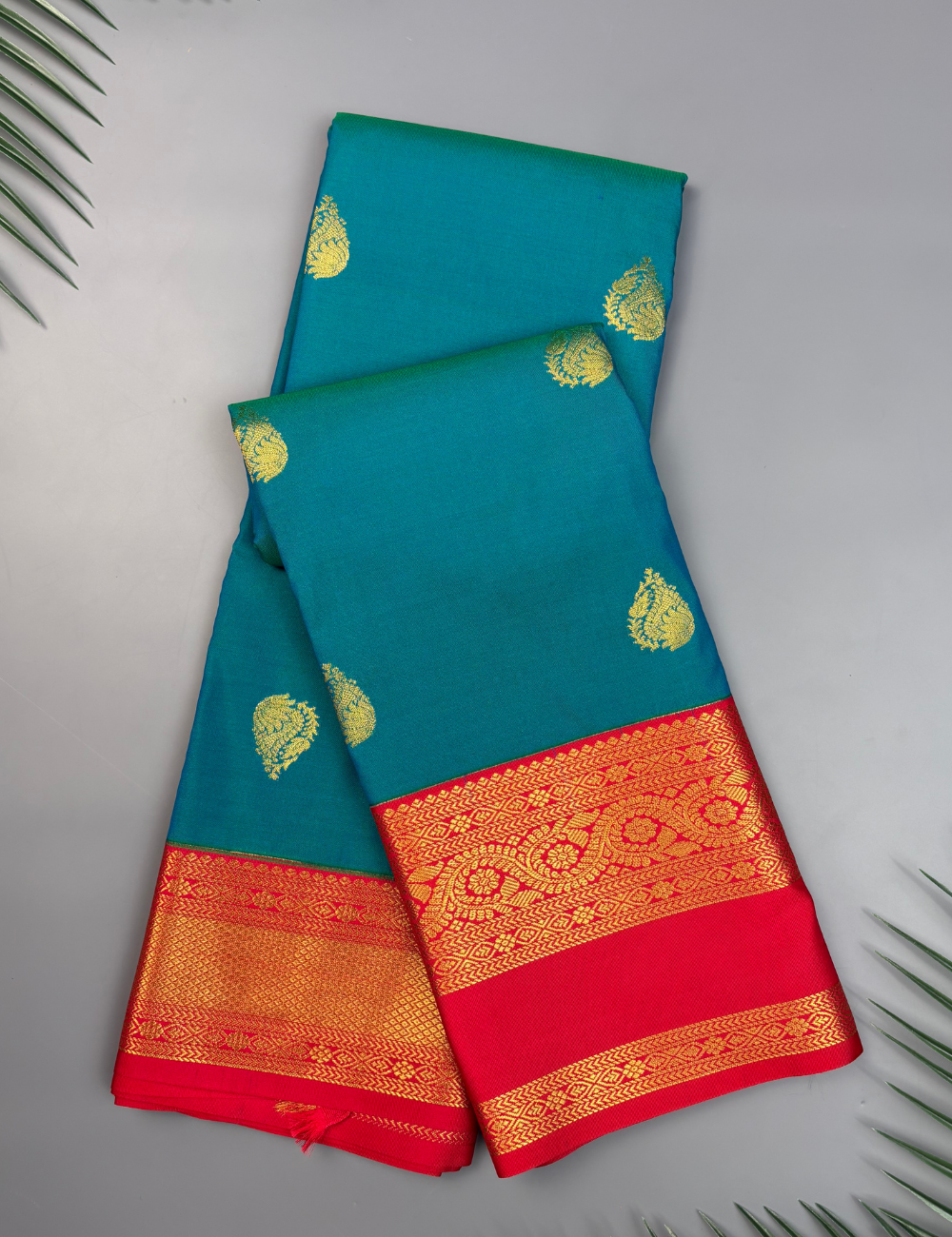 Peacock Blue Soft Semi Silk Kanjivaram Saree with Vibrant Coral Red Border