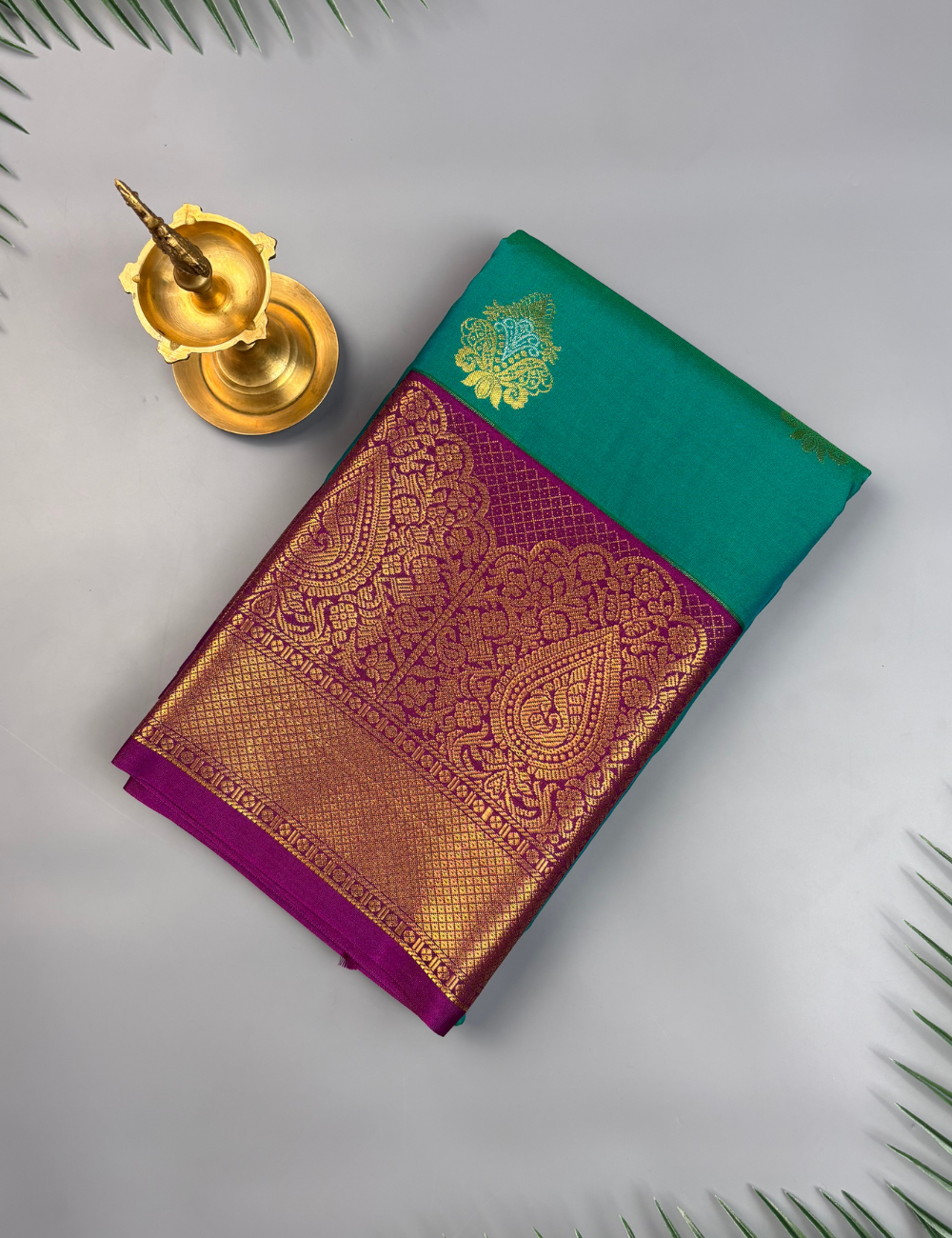 Peacock green soft semi silk kanjivaram saree with magenta korvai border