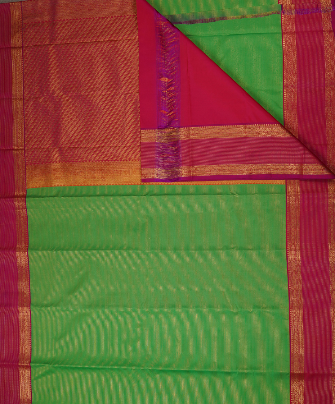 Parrot Green Soft Semi Silk Kanjivaram with Rani Pink Retta Pettu Zari Border