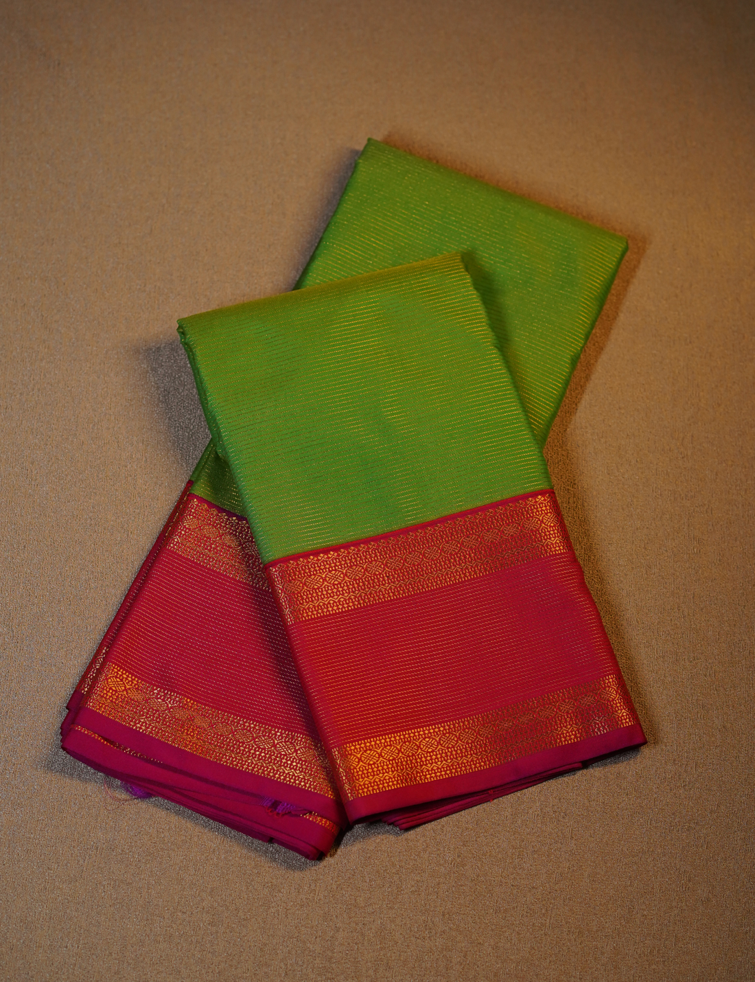 Parrot Green Soft Semi Silk Kanjivaram with Rani Pink Retta Pettu Zari Border