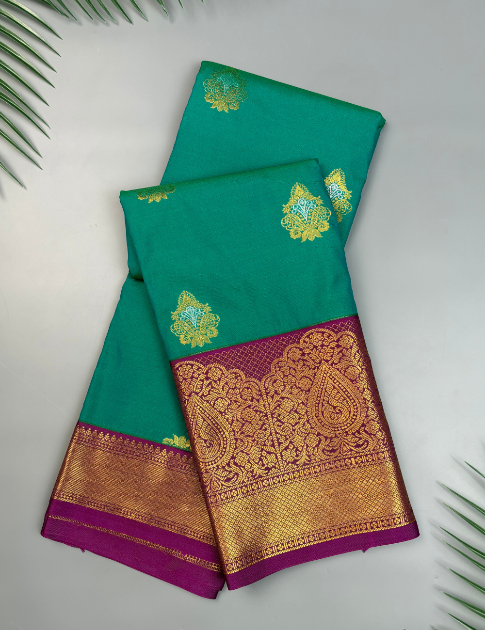 Peacock green soft semi silk kanjivaram saree with magenta korvai border