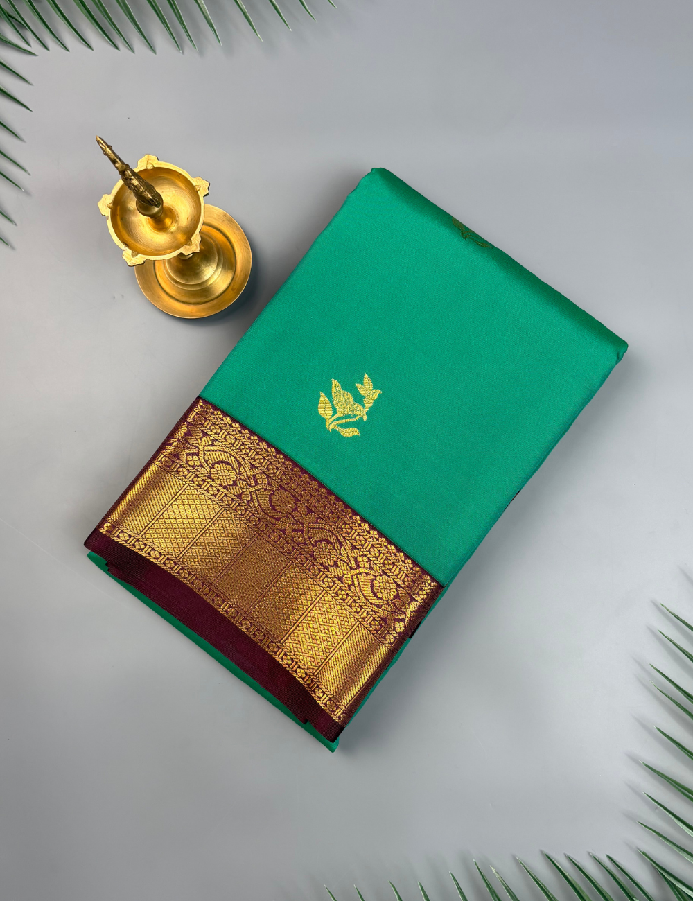 Rama Green soft semi silk kanjivaram saree with korvai purple border