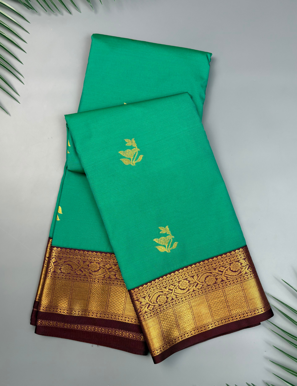 Rama Green soft semi silk kanjivaram saree with korvai purple border