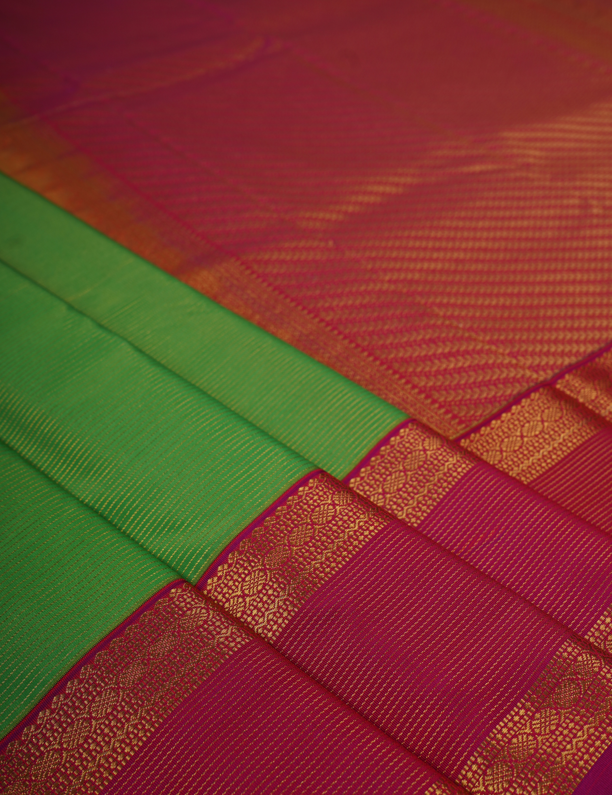 Parrot Green Soft Semi Silk Kanjivaram with Rani Pink Retta Pettu Zari Border