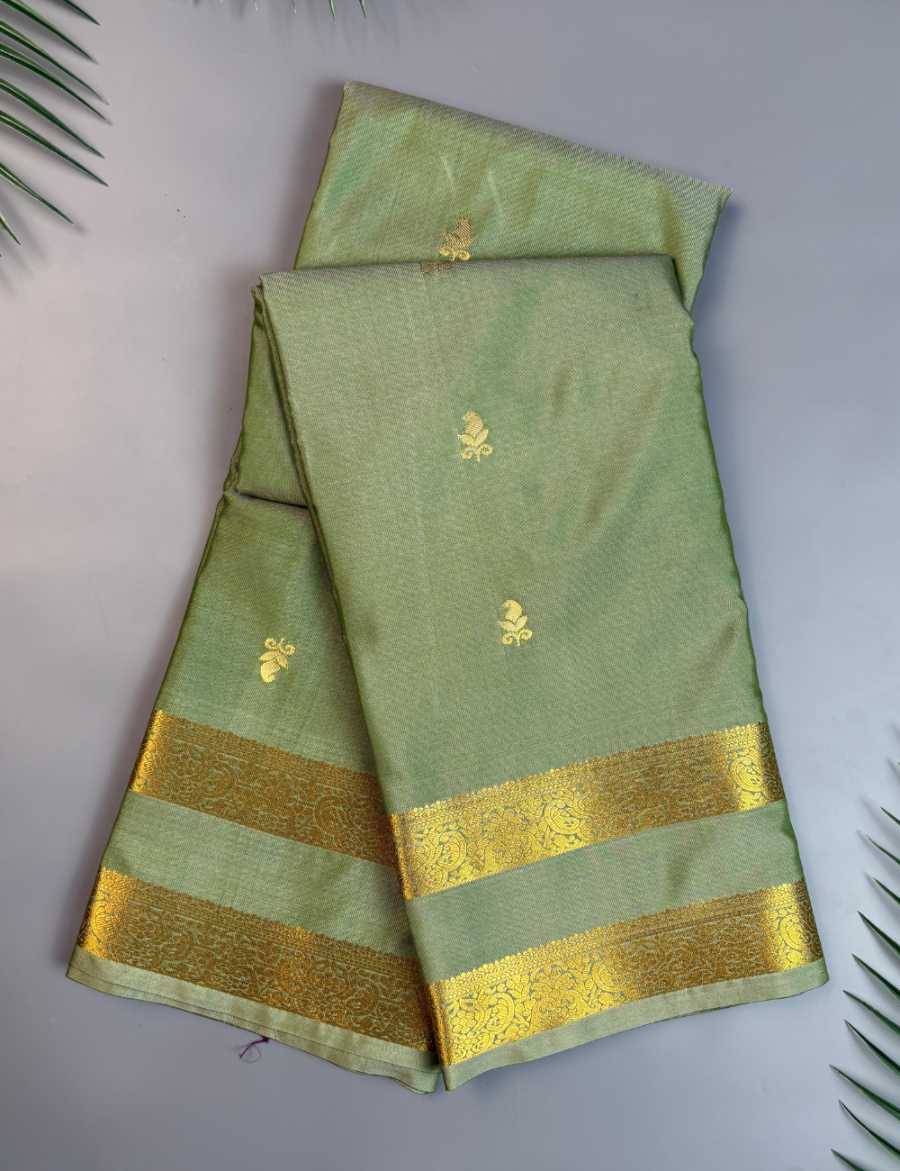 Sage Green Soft Semi Silk Saree with Gold Zari Border & Floral Buttis