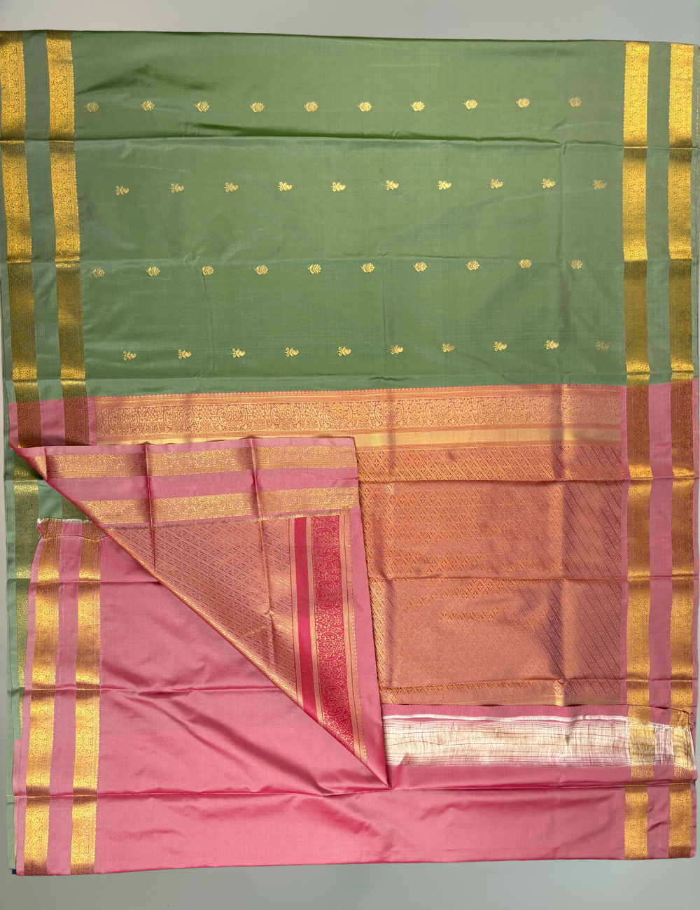 Sage Green Soft Semi Silk Saree with Gold Zari Border & Floral Buttis