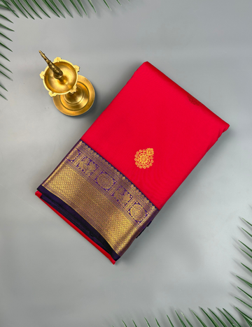 Coral Red Semi Silk Saree with Contrast Royal Purple Zari Border & Gold Chakram Motifs